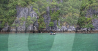 Fishermen in the Lan Ha Bay, Cat Ba Island, a typical Karst landscape in Vietnam