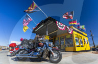 Harley Davidson motorcycle and Historic building on Route 66, Kingman, Arizona, USA, America, United States, North America
