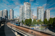 View of Sky Train and urban office blocks and apartments, Vancouver, British Columbia, Canada, North America