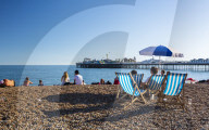 Brighton Palace Pier and beach, Brighton and Hove, East Sussex, England, United Kingdom, Europe