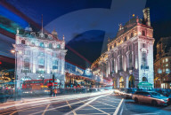 Traffic trails and Festive Christmas lights at night near Piccadilly Circus, London, England, United Kingdom, Europe