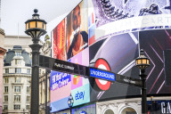 Entrance to tube station, advertisement, Piccadilly Circus, London, England, United Kingdom, Europe