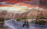 Motocycles driving through The Red Rock Canyon National Recreation Area at sunset, Las Vegas, Nevada, USA, North America