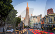 View of Transamerica Pyramid building on Columbus Avenue and car trail lights, San Francisco, California, USA, North America