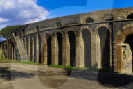 Pompeii, Italy amphitheater external view. Side entrance to the ruins of stone built 20.000 capacity Roman Anfiteatro di Pompeii