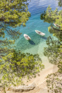 Two small boats anchoring at Podrace Beach near Brela and Makarska
