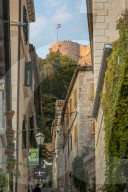 View from the old town of Hvar to the Spanish Fortress at sunset