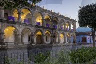The town of Antigua decorated with banners for the Holy Week at dusk