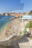 View over Banje Beach and the old town of Dubrovnik in the background