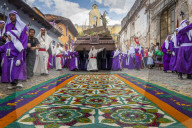 Good Friday Procession approaching a sawdust carpet during Holy Week 2017 in Antigua