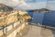 Viem from Lovrijenac Fortress to the city walls of the old town of Dubrovnik and Lokrum Island