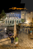 Night shot of the main square (Trg Svetog Stjepana) of Hvar Town with view to the Spanish Fortress in the background