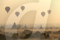 Hot air ballons fly over ancient temples at dawn in Bagan, Myanmar (Burma)