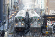 Two Chicago CTA 'L' trains near Adams & Wabash station in The Loop, Chicago, Illinois
