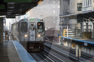 Green Line Chicago CTA 'L' train to Harlem heading North at Adams & Wabash station, Chicago, Illinois