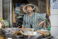 Chinatown street vendor smiling