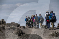 A group of Trekkers on the Machame Route on Kilimanjaro descending towards the clouds