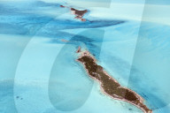 small islands in the shallow waters of the exumas, aerial