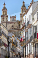 Church overlooking Semana santa decoration on buildings