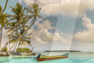 A colourful boat on the beautiful Island Pelicano in the San Blas Islands, Kuna Yala, Panama, Central America.
