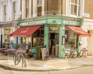 The pretty L' Absinthe restaurant and coffee shop in Primrose Hill, London, England, United Kingdom.