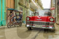 A vintage American car in a colourful street in Havana, Cuba, Caribbean.