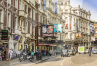 A view of Shaftsbury Avenue in theatreland, in Soho, London, England, United Kingdom, Europe.