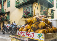 A street stall selling coconuts in the old town in Cartagena de Indias, Colombia, South America.