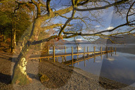 Autumn at Low Brandelhow jetty on Derwentwater in the Lake District National Park, Cumbria, England, U.K.