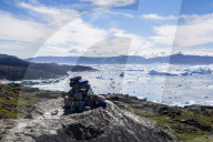 Blue trail Holms Bakke hike beside Ilulissat Icefjord with icebergs from Jakobshavn Glacier, A UNESCO World Heritage site