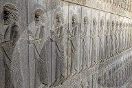 The monumental stairs of the Apadana. The subject nations of the Persian Empire paying tribute to Darius I . Persepolis. Iran.