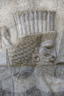 Bas relief of a persian soldier. The monumental stairs of the Apadana. Persepolis. Iran.