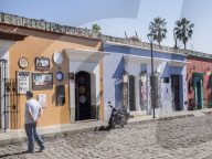 Street scene of colorful buildings, Oaxaca, Mexico, North America