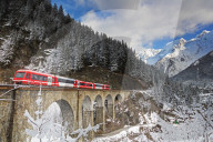 Europe, France, Rhone Alps, Haute Savoie, Chamonix, Mont Blanc Express train going over a viaduct