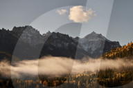 Snow-covered mountain in the fall with fog, Uncompahgre National Forest, Colorado, USA