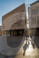 People walking past Parliament House on Freedom Square in Valletta, which is European Capital of Culture 2018.
