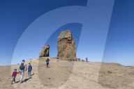 People enjoying hiking to the volcanic Roque Nublo in the Nublo Rural Park in the centre of Gran Canaria