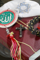 Christianity, buddhism, Islam and Judaism. Interfaith symbols : bible, cucifix, Kippah, Allah monogram and mala.