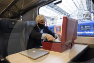 Prime Minister Boris Johnson gets train at Waterloo