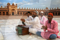 Qawali musician performing in the courtyard of Fatehpur Sikri Jama Masjid (Great Mosque), Fatehpur Sikri. India.