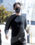 PREMIUM EXCLUSIVE Tobey Maguire Steps Out With Disheveled Hair And Raggety Sweats
