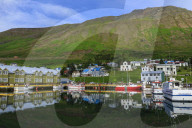 Harbour, hotel and fishing boats, mountains, reflections, Siglufjordur, (Siglufjorour), stunning Summer weather, North Iceland