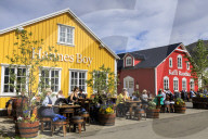 Busy, colourful cafes, Siglufjordur, (Siglufjorour), stunning Summer weather, northernmost town of the mainland, North Iceland