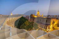 Illuminated church of the Annunciation from rooftop of Metropol Parasol, Plaza de la Encarnacion, Seville, Andalusia, Spain