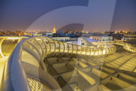 Illuminated spiral curved walkways on rooftop of the Metropol Parasol, Plaza de la Encarnacion, Seville, Andalusia, Spain