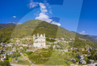 Panoramic of terraced vineyards and sanctuary Santa Casa di Loreto, Tresivio, Sondrio province, Valtellina, Lombardy, Italy