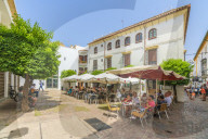 Tourists having lunch in the traditional restaurant of the old town, Cordoba, Andalusia, Spain