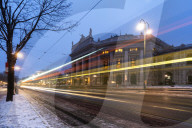 Lights of car trails on the icy road beside the famous Burgtheater, Austrian National Theatre, Vienna