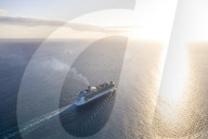 Cruise ship sailing in the Caribbean Sea at sunset, aerial view, Antilles, Central America (drone)