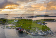 Sunset over the traditional houses of fishermen on islets along the Atlantic Road, More og Romsdal county, Norway